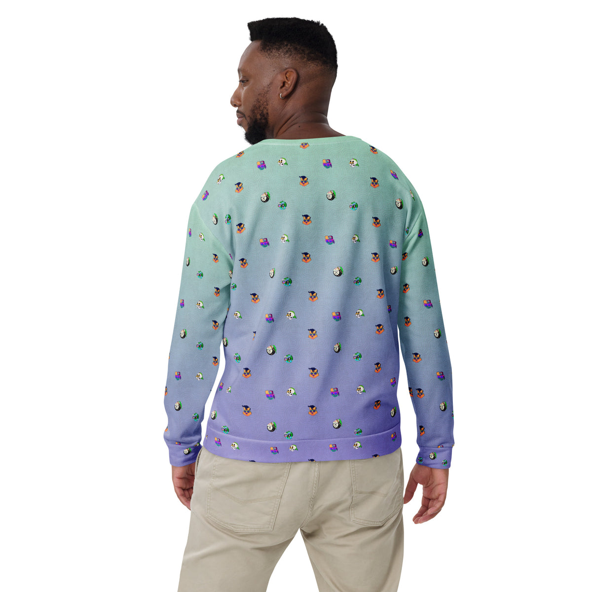 Hand-drawn cartoon heads pattern on a bold illustrated graphic sweatshirt