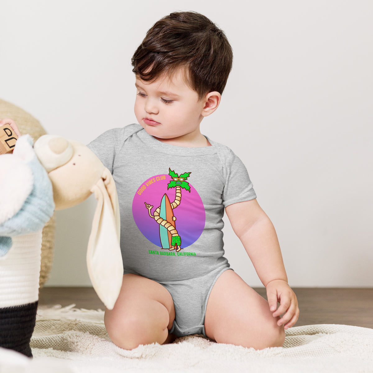 Good vibes beach graphic one piece for babies by illustrator Daniel Sulzberg