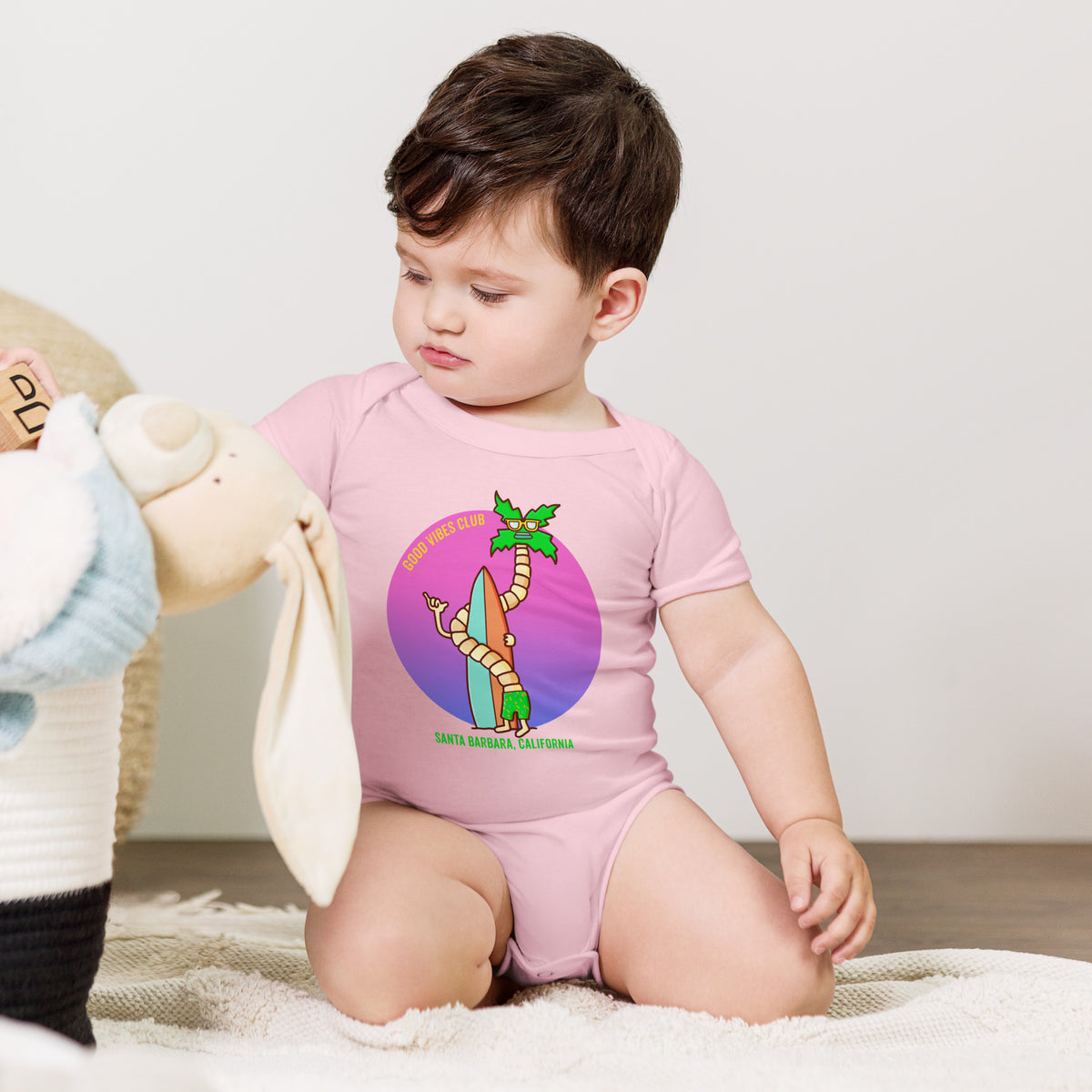 Original Santa Barbara surf illustration on an infant bodysuit for coastal families