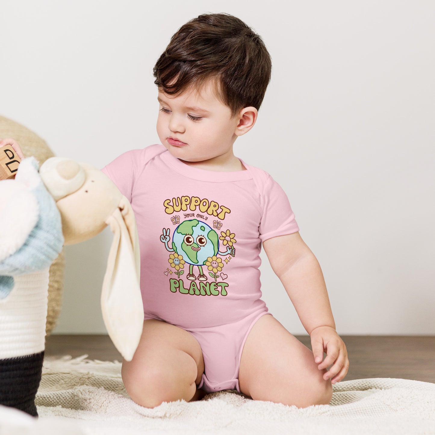 Baby shower gift for green families, an illustrated happy planet bodysuit