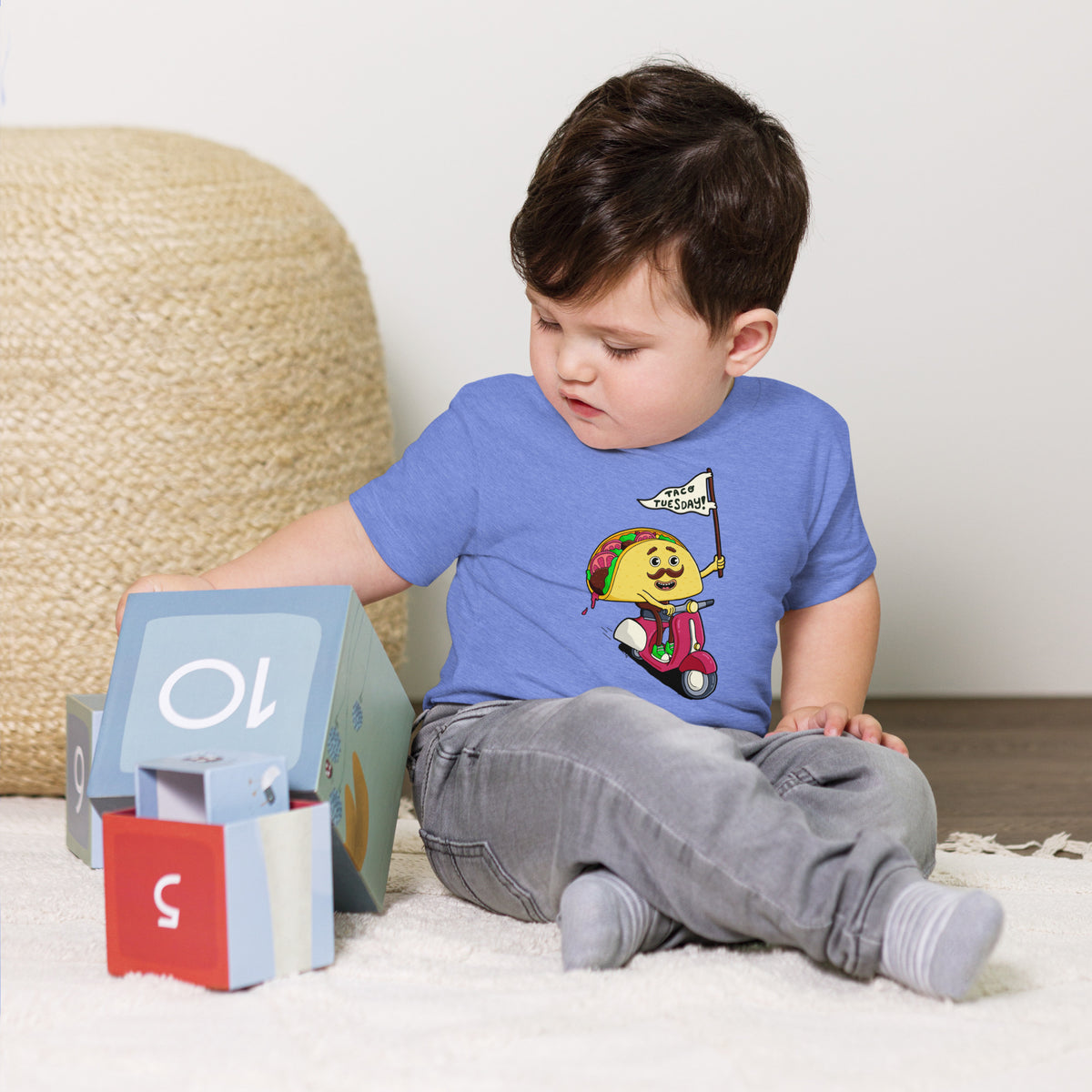 Colorful hand-drawn toddler t-shirt built around an illustrated taco design by Santa Barbara illustrator Daniel Sulzberg