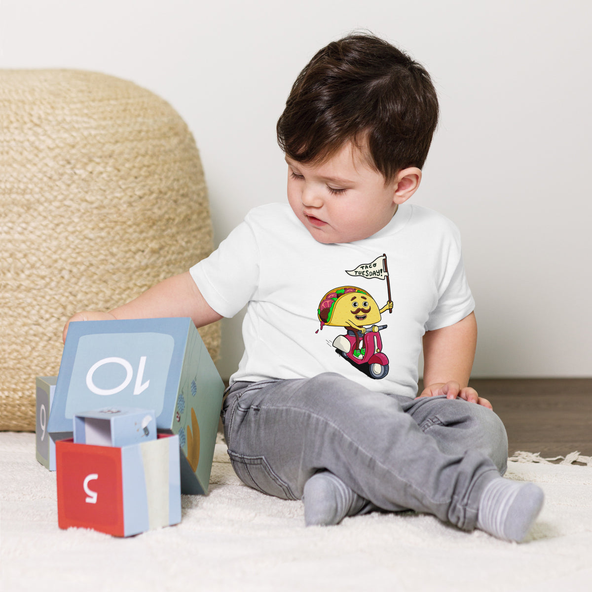 Illustrated toddler tee featuring a hand-drawn taco illustration by Santa Barbara illustrator Daniel Sulzberg