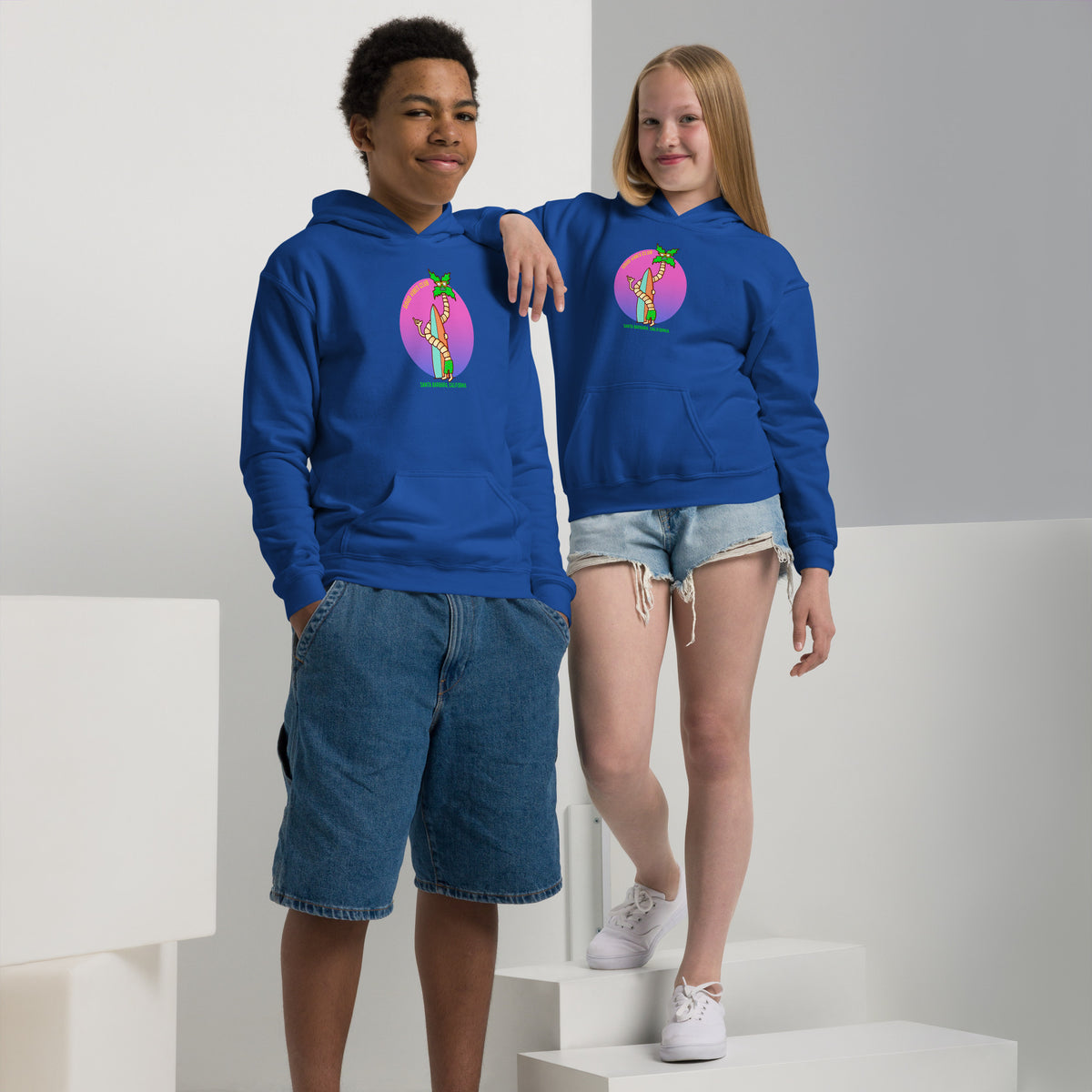 Hand-drawn palm and surf artwork on a bright California youth pullover hoodie