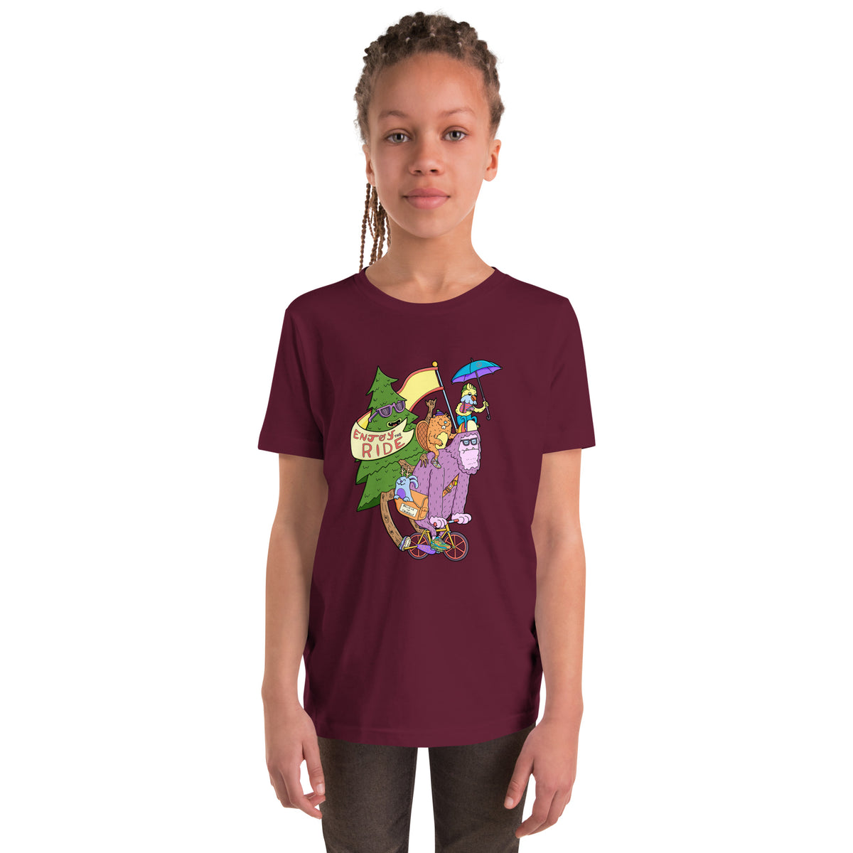 Hand-drawn cryptid cycling illustration on a kids graphic tee by Daniel Sulzberg