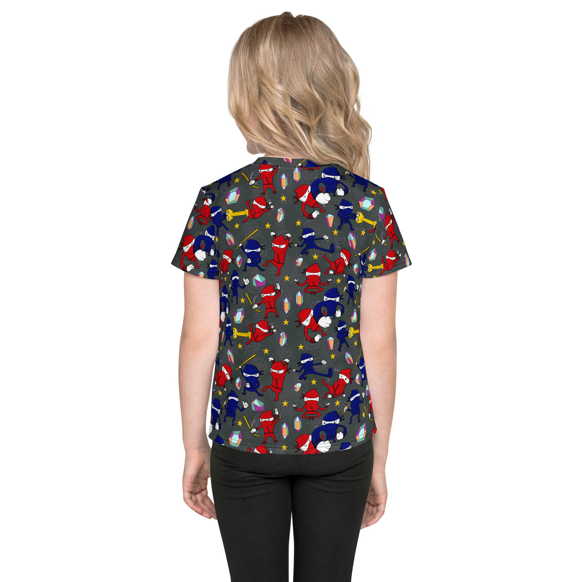Hand-drawn ninjas and crystals across a bright illustrated kids graphic t-shirt