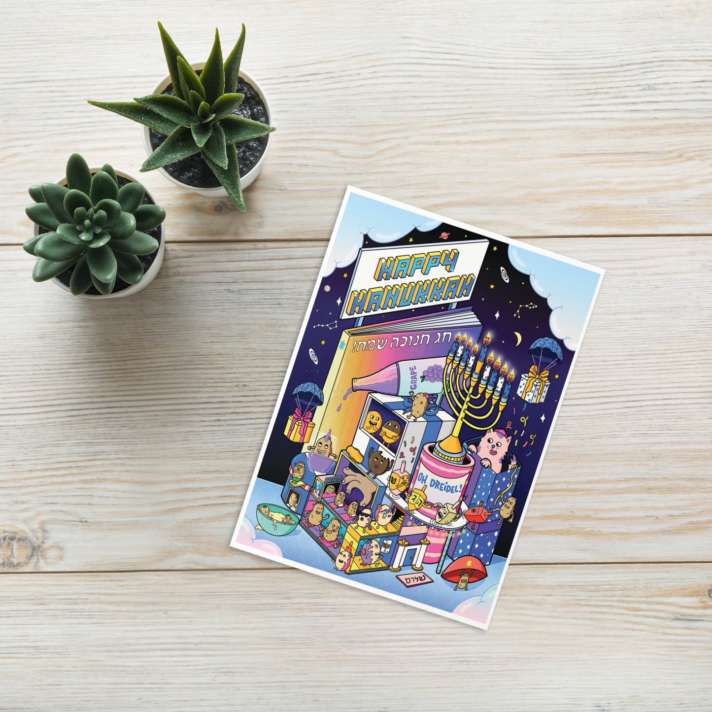 Hand-drawn candles, dreidels and latkes on a bright and whimsical Hanukkah card
