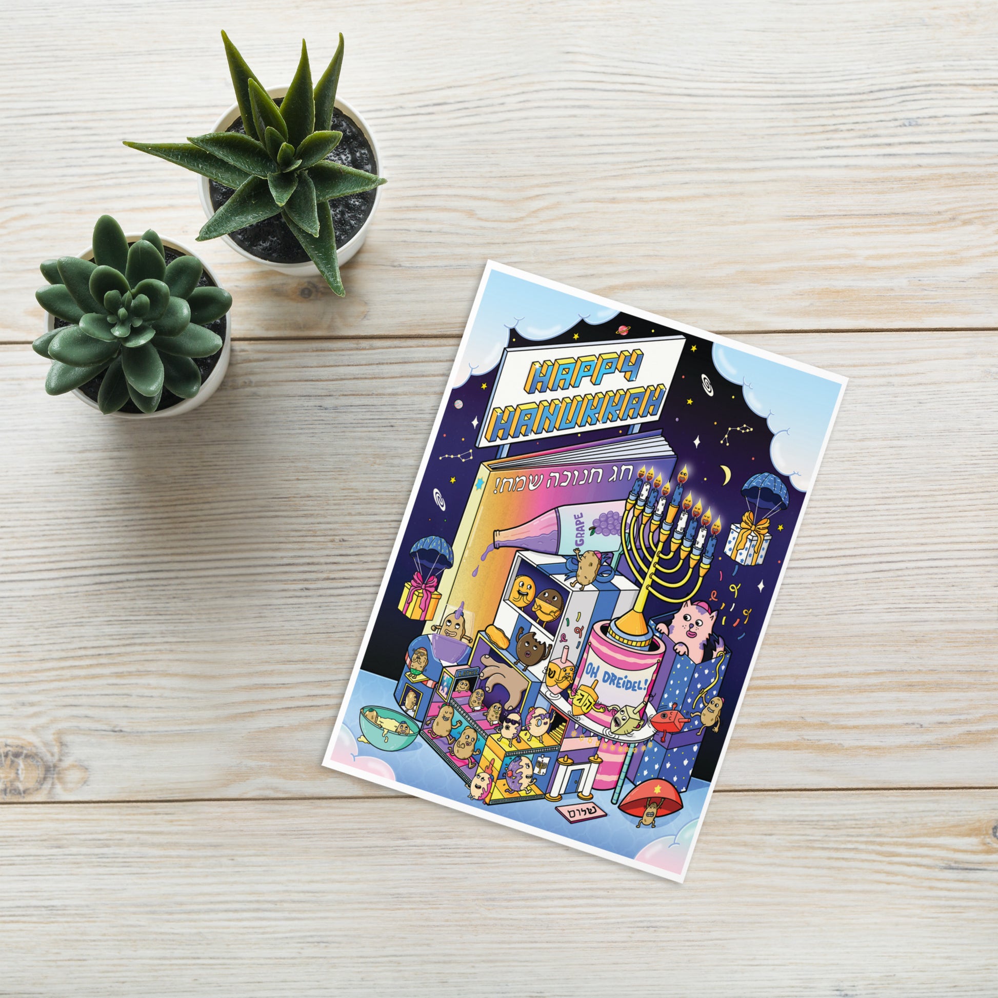 Hand-drawn candles, dreidels and latkes on a bright and whimsical Hanukkah card